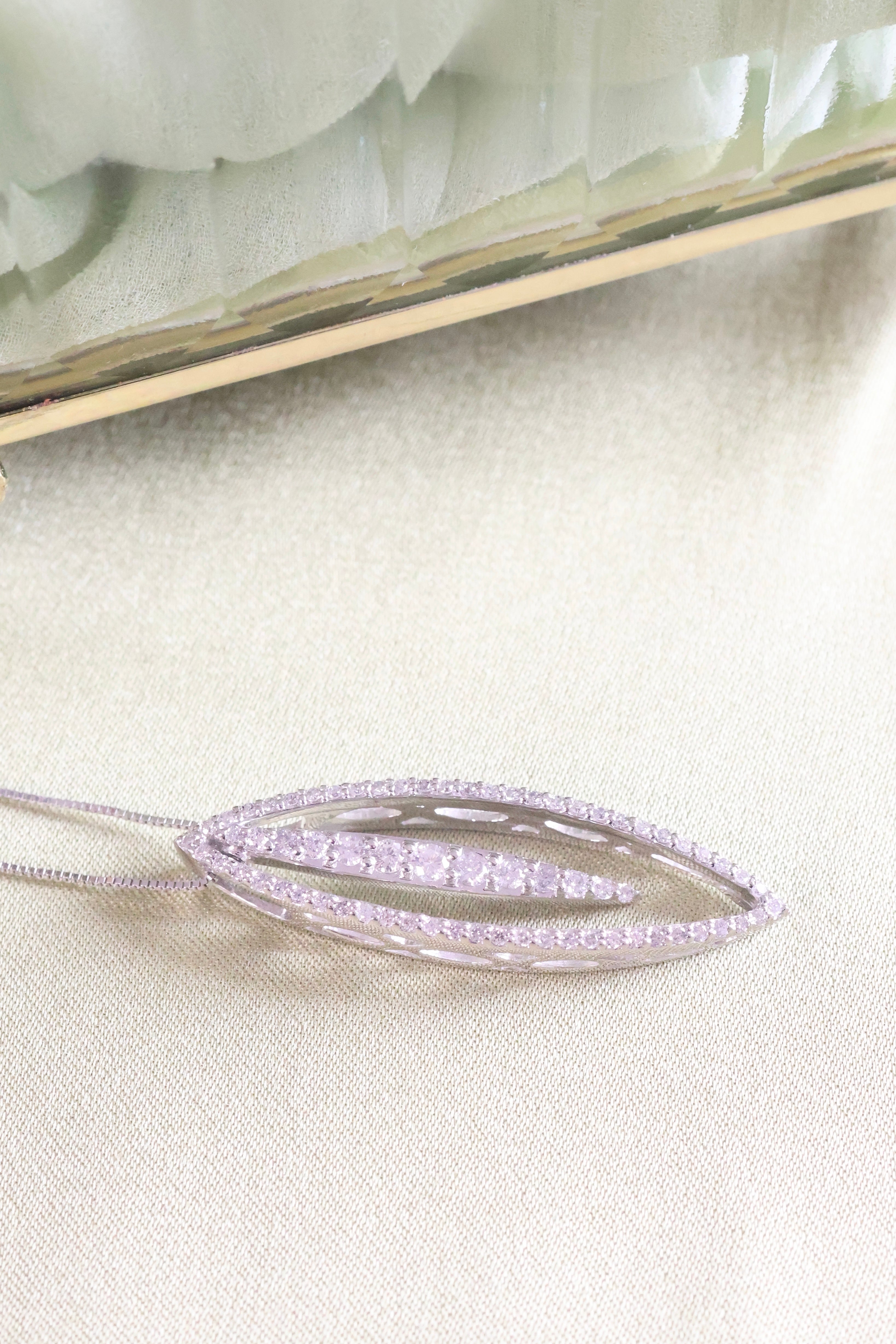 14K White Gold Swig Necklace Pendant with 1.10ct. t.w. Diamonds