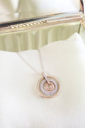 Three-Tone Solid Gold Circle Pendant with 1/3ct. t.w. Cut Diamonds
